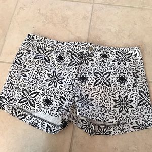 White with black floral pattern shorts